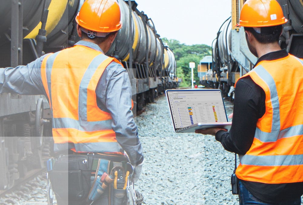 Workers using Datasite's virtual data room for oil and gas on a work site
